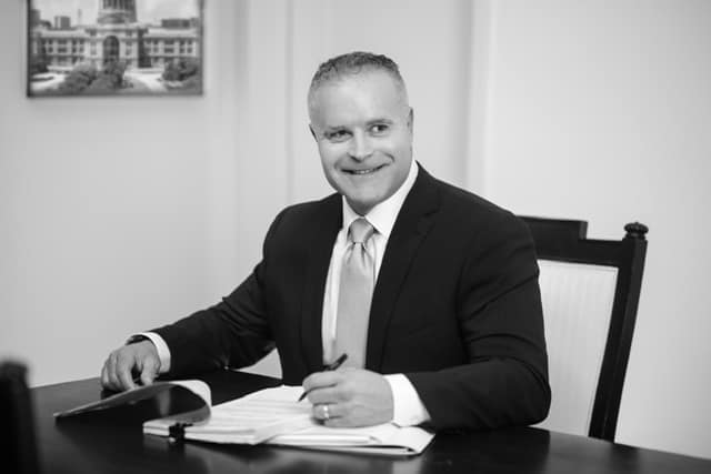 James Ballard Attorney working at desk